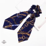 Chouchou foulard luxueux en tissu élégant